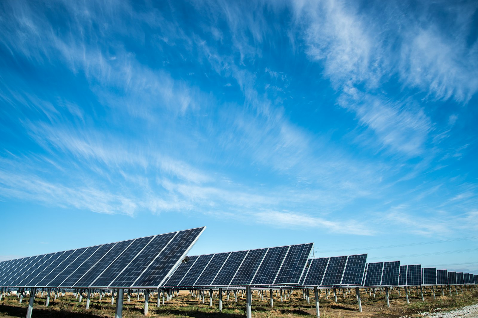 Solar panels under a blue sky