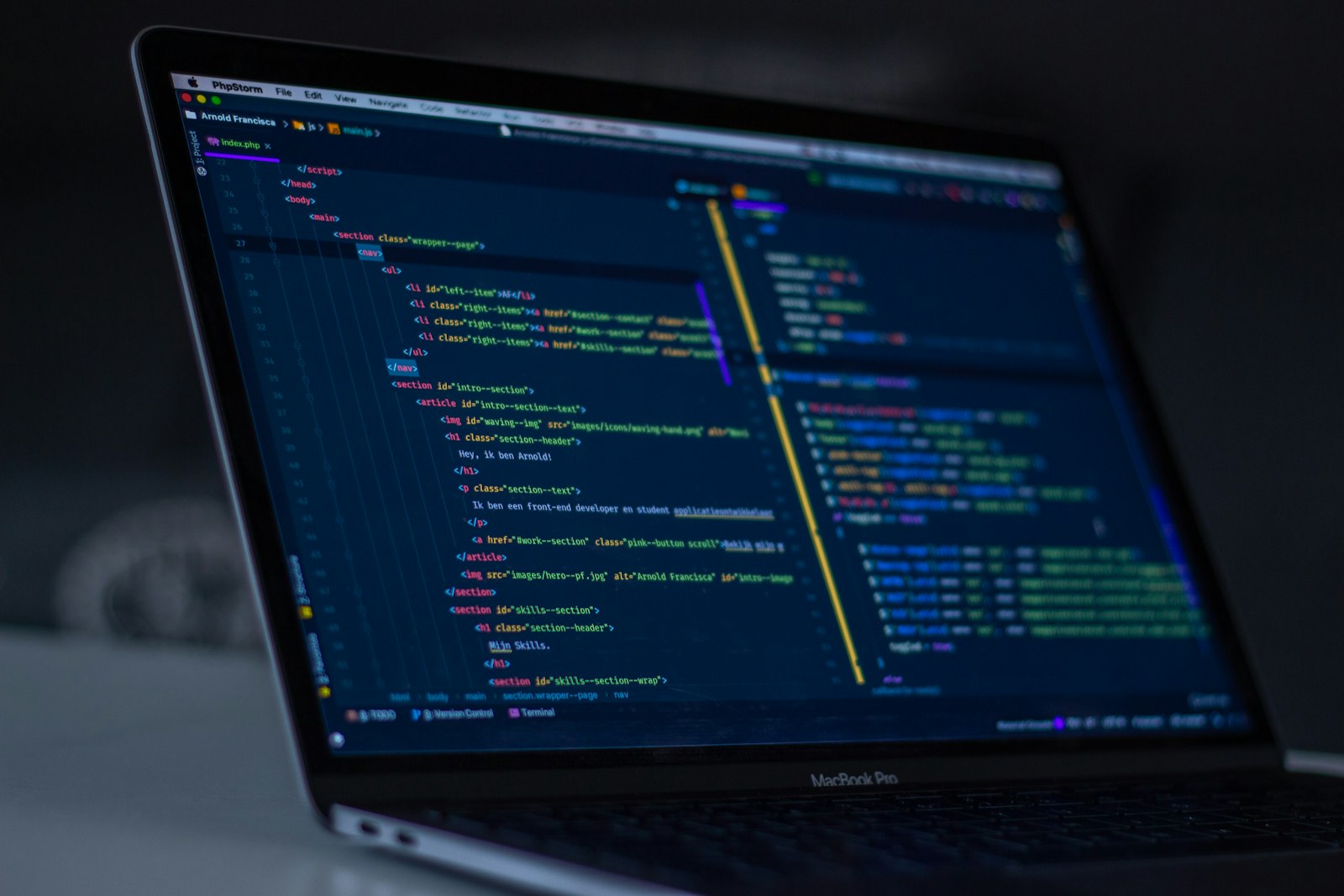 Laptop showing application code